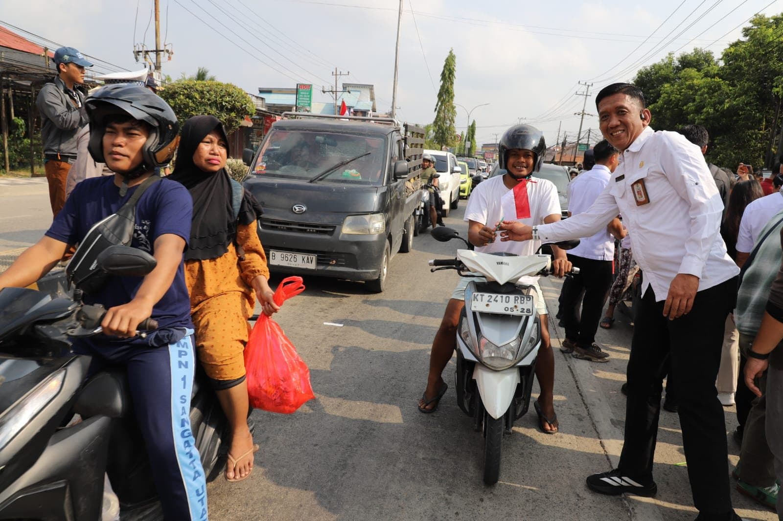 Kadispora Kutim Ikut Turun ke Jalan, Ajak Pemuda Kibarkan Merah Putih